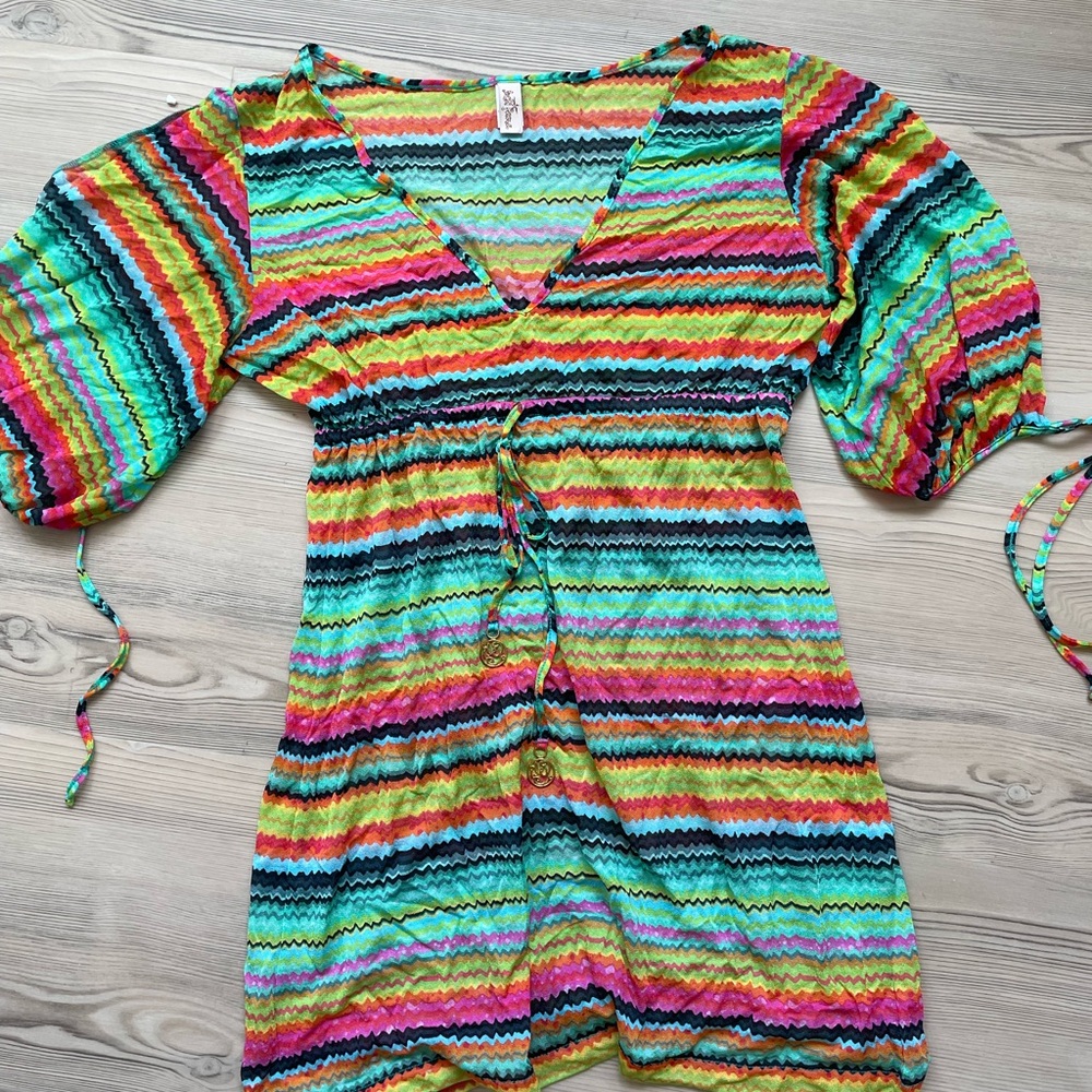 Luli fans swim coverup